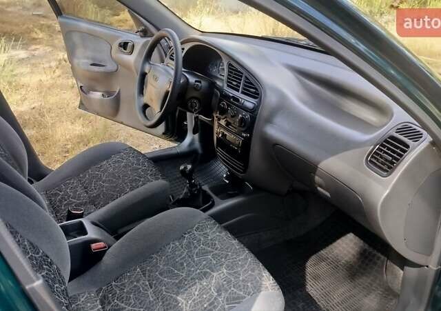 Зелений Деу Ланос, об'ємом двигуна 1.6 л та пробігом 201 тис. км за 2999 $, фото 11 на Automoto.ua
