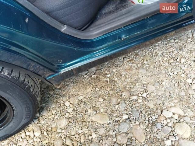 Дэу Ланос 2005 в Ивано-Франковске на Automoto.ua Зеленый Дэу Ланос, объемом двигателя 1.5 л и пробегом 158 тыс. км за 2100 $, фото 17 на Automoto.ua