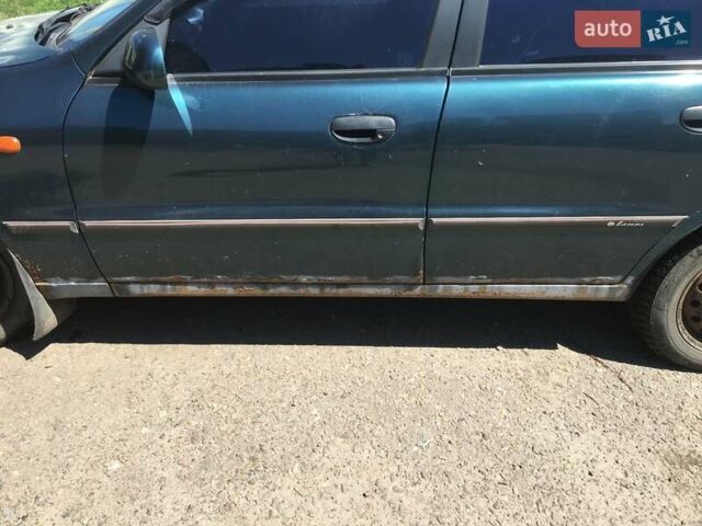 Зеленый Дэу Ланос, объемом двигателя 1.5 л и пробегом 215 тыс. км за 1300 $, фото 3 на Automoto.ua