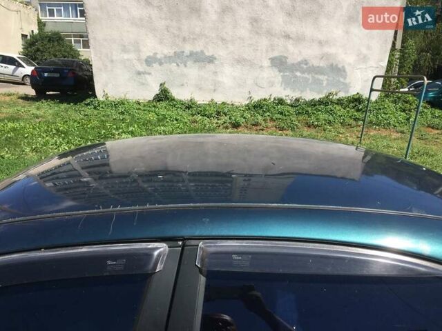 Зеленый Дэу Ланос, объемом двигателя 1.5 л и пробегом 215 тыс. км за 1300 $, фото 7 на Automoto.ua