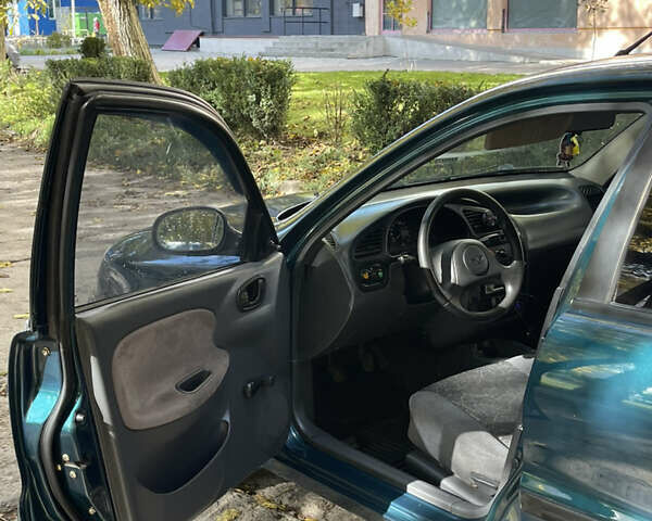 Дэу Ланос 2005 в Каменце-Подольском на Automoto.ua Зеленый Дэу Ланос, объемом двигателя 1.5 л и пробегом 223 тыс. км за 2599 $, фото 9 на Automoto.ua