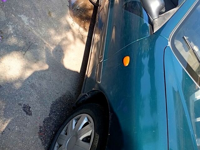 Зеленый Дэу Ланос, объемом двигателя 1.6 л и пробегом 269 тыс. км за 950 $, фото 1 на Automoto.ua