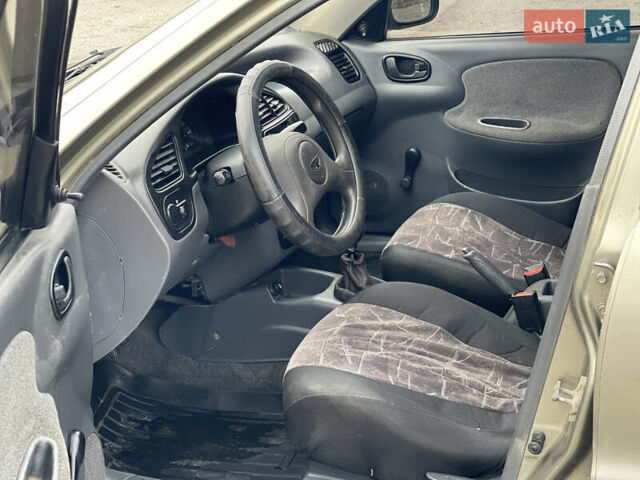 Зеленый Дэу Ланос, объемом двигателя 1.5 л и пробегом 130 тыс. км за 1700 $, фото 3 на Automoto.ua