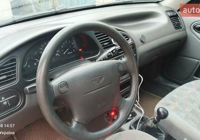 Зеленый Дэу Ланос, объемом двигателя 1.5 л и пробегом 223 тыс. км за 2200 $, фото 4 на Automoto.ua