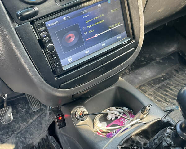 Зеленый Дэу Ланос, объемом двигателя 1.35 л и пробегом 163 тыс. км за 1800 $, фото 4 на Automoto.ua