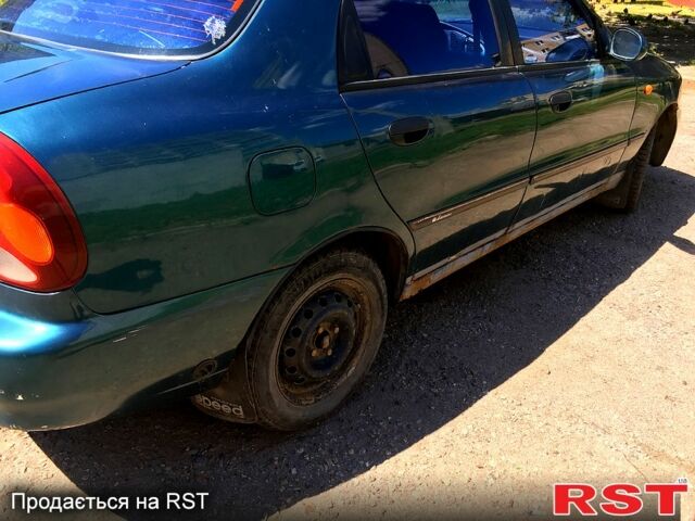 Зелений Деу Ланос, об'ємом двигуна 1.6 л та пробігом 215 тис. км за 1300 $, фото 5 на Automoto.ua