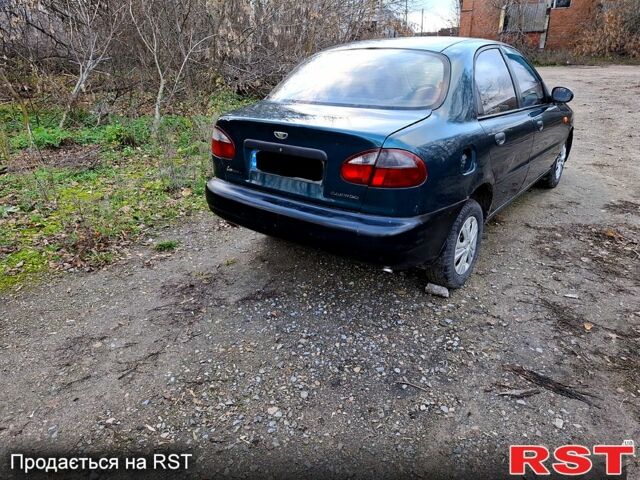 Зеленый Дэу Ланос, объемом двигателя 1.5 л и пробегом 180 тыс. км за 1150 $, фото 3 на Automoto.ua