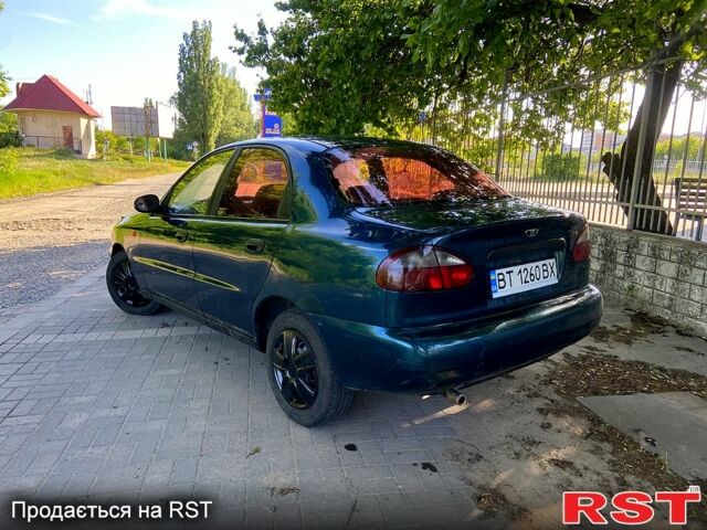 Зеленый Дэу Ланос, объемом двигателя 1.5 л и пробегом 250 тыс. км за 1650 $, фото 3 на Automoto.ua
