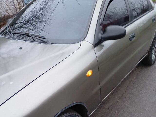 Зеленый Дэу Ланос, объемом двигателя 1.5 л и пробегом 255 тыс. км за 1774 $, фото 7 на Automoto.ua