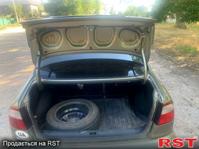 Зеленый Дэу Ланос, объемом двигателя 1.5 л и пробегом 175 тыс. км за 2499 $, фото 4 на Automoto.ua