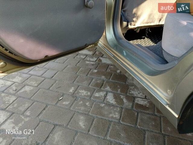 Зеленый Дэу Ланос, объемом двигателя 1.5 л и пробегом 212 тыс. км за 2700 $, фото 7 на Automoto.ua