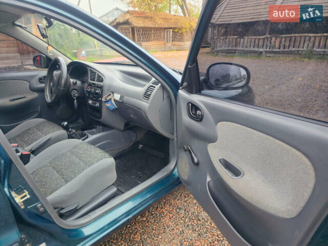 Зеленый Дэу Ланос, объемом двигателя 1.5 л и пробегом 125 тыс. км за 2700 $, фото 7 на Automoto.ua