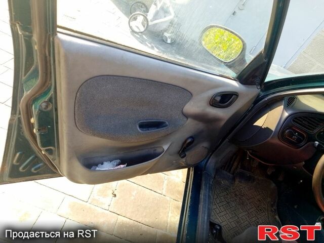 Зеленый Дэу Ланос, объемом двигателя 1.3 л и пробегом 100 тыс. км за 2500 $, фото 3 на Automoto.ua