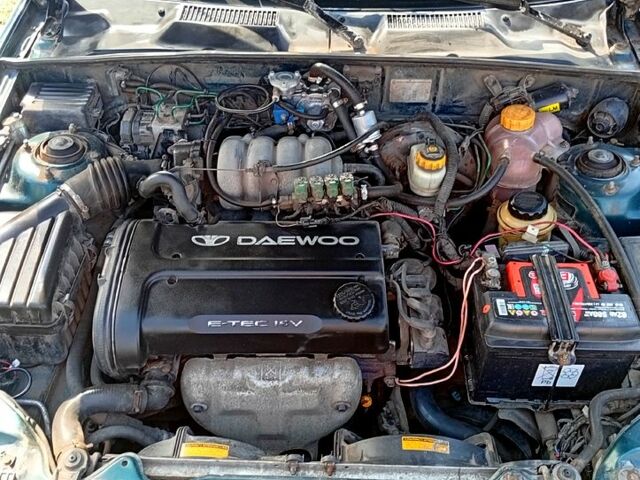 Зеленый Дэу Ланос, объемом двигателя 1.6 л и пробегом 269 тыс. км за 950 $, фото 5 на Automoto.ua