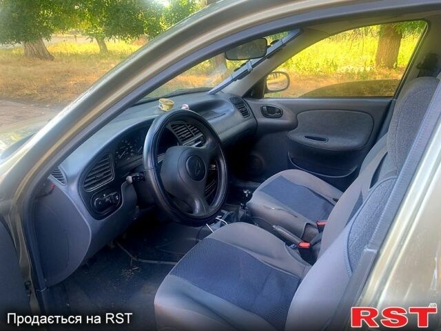 Зеленый Дэу Ланос, объемом двигателя 1.5 л и пробегом 175 тыс. км за 2499 $, фото 10 на Automoto.ua