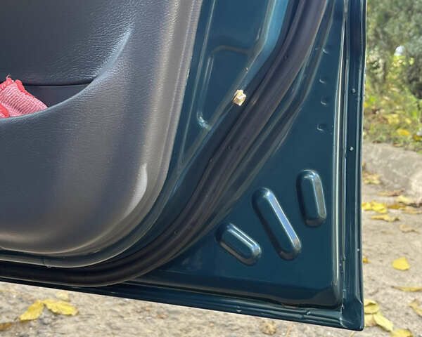 Дэу Ланос 2005 в Каменце-Подольском на Automoto.ua Зеленый Дэу Ланос, объемом двигателя 1.5 л и пробегом 223 тыс. км за 2599 $, фото 13 на Automoto.ua