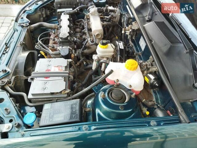 Дэу Ланос 2005 в Ивано-Франковске на Automoto.ua Зеленый Дэу Ланос, объемом двигателя 1.5 л и пробегом 158 тыс. км за 2100 $, фото 22 на Automoto.ua