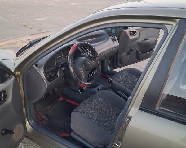 Зеленый Дэу Ланос, объемом двигателя 1.3 л и пробегом 200 тыс. км за 2300 $, фото 3 на Automoto.ua