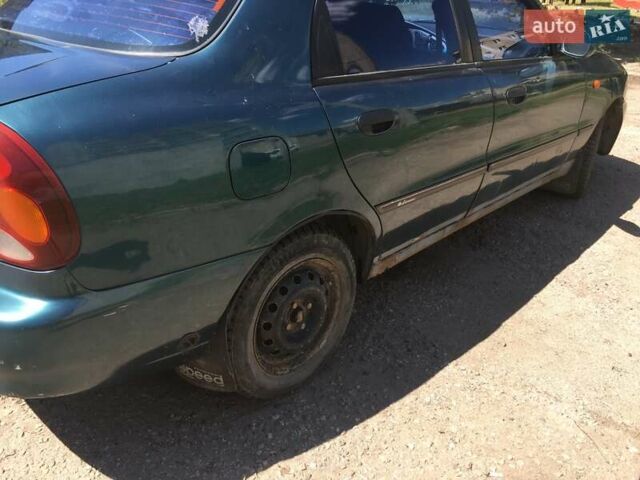 Зеленый Дэу Ланос, объемом двигателя 1.5 л и пробегом 215 тыс. км за 1300 $, фото 10 на Automoto.ua