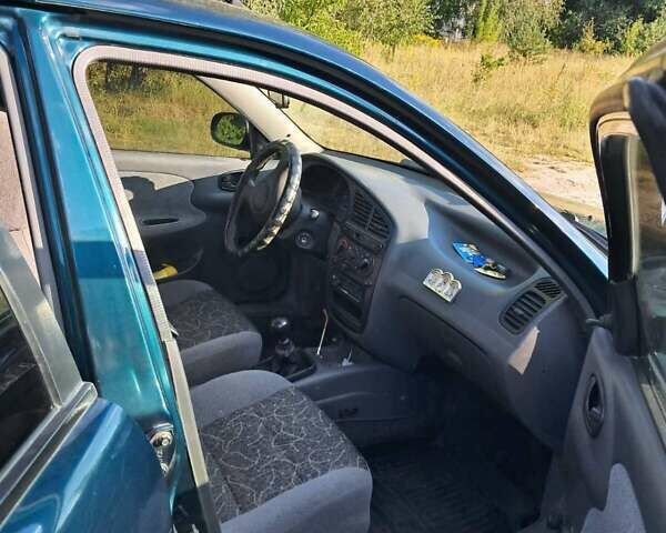 Зелений Деу Ланос, об'ємом двигуна 1.5 л та пробігом 138 тис. км за 2500 $, фото 9 на Automoto.ua