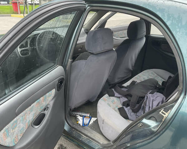 Зеленый Дэу Ланос, объемом двигателя 1.6 л и пробегом 233 тыс. км за 1900 $, фото 1 на Automoto.ua