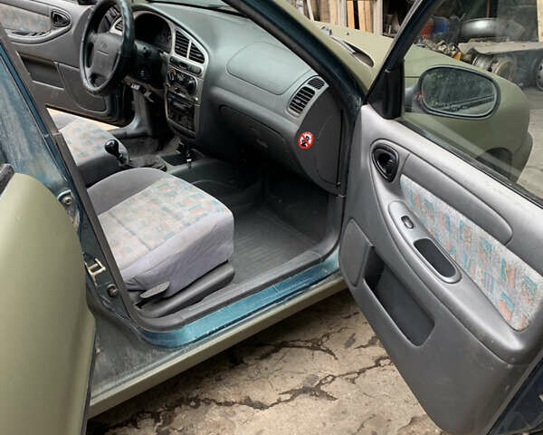 Зелений Деу Ланос, об'ємом двигуна 1.6 л та пробігом 248 тис. км за 2500 $, фото 11 на Automoto.ua