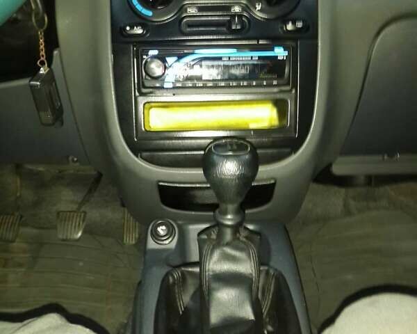 Зелений Деу Ланос, об'ємом двигуна 1.5 л та пробігом 125 тис. км за 3200 $, фото 14 на Automoto.ua