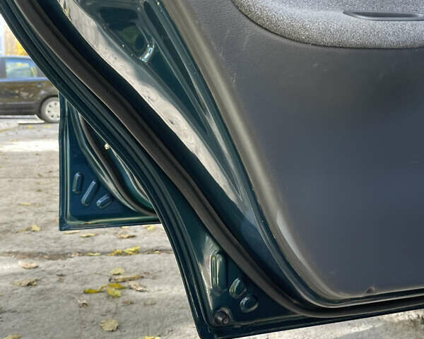 Дэу Ланос 2005 в Каменце-Подольском на Automoto.ua Зеленый Дэу Ланос, объемом двигателя 1.5 л и пробегом 223 тыс. км за 2599 $, фото 15 на Automoto.ua