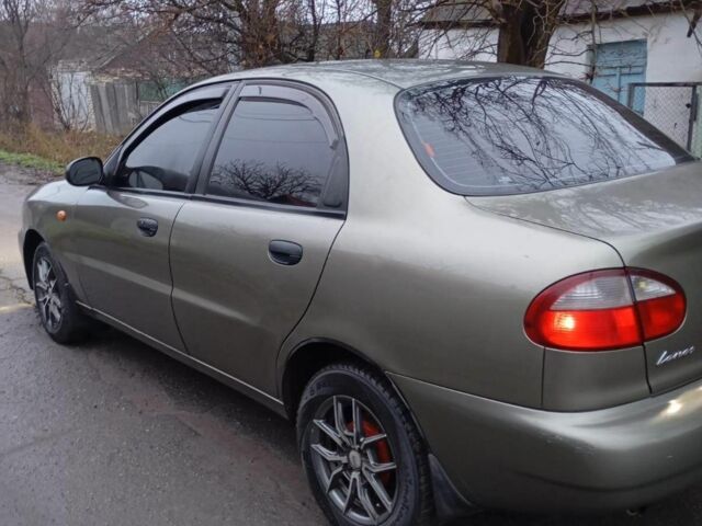 Зеленый Дэу Ланос, объемом двигателя 1.5 л и пробегом 255 тыс. км за 1774 $, фото 2 на Automoto.ua