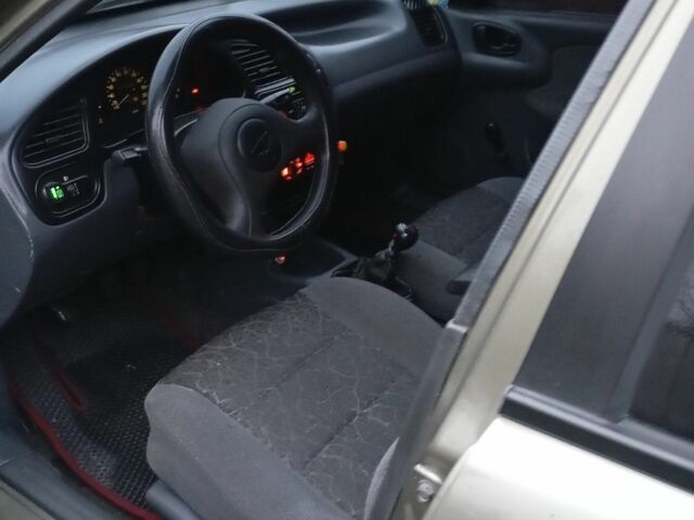 Зеленый Дэу Ланос, объемом двигателя 1.5 л и пробегом 255 тыс. км за 1774 $, фото 8 на Automoto.ua