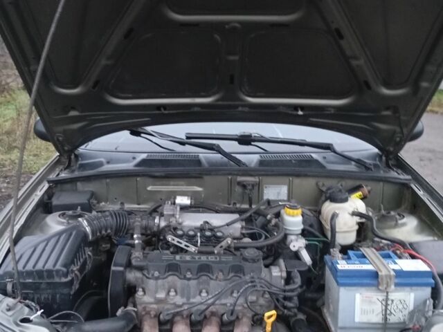 Зеленый Дэу Ланос, объемом двигателя 1.5 л и пробегом 255 тыс. км за 1774 $, фото 9 на Automoto.ua