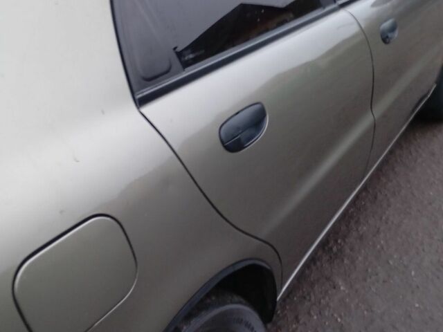 Зеленый Дэу Ланос, объемом двигателя 1.5 л и пробегом 255 тыс. км за 1774 $, фото 6 на Automoto.ua