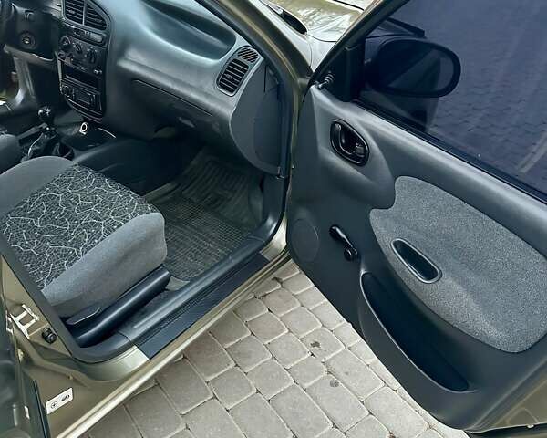 Зелений Деу Ланос, об'ємом двигуна 1.5 л та пробігом 145 тис. км за 2847 $, фото 24 на Automoto.ua