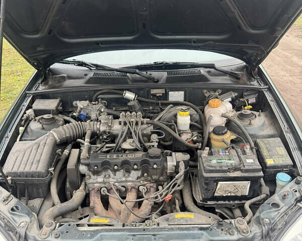 Зеленый Дэу Ланос, объемом двигателя 1.5 л и пробегом 240 тыс. км за 2850 $, фото 12 на Automoto.ua