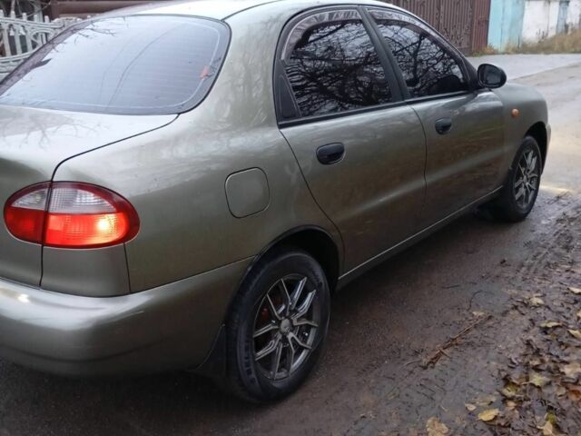 Зеленый Дэу Ланос, объемом двигателя 1.5 л и пробегом 255 тыс. км за 1774 $, фото 3 на Automoto.ua