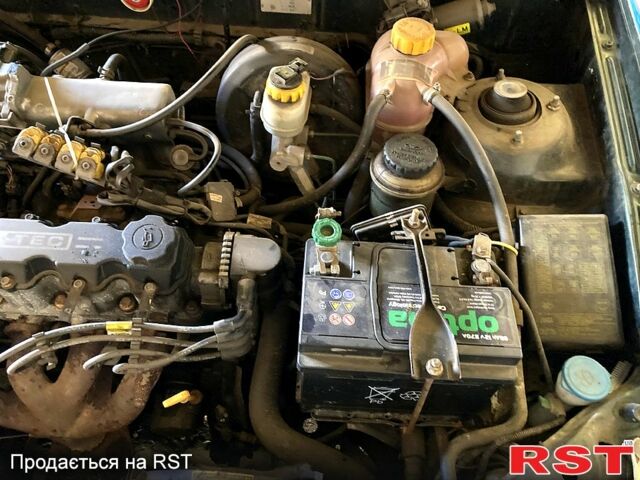 Зеленый Дэу Ланос, объемом двигателя 1.5 л и пробегом 290 тыс. км за 1000 $, фото 7 на Automoto.ua