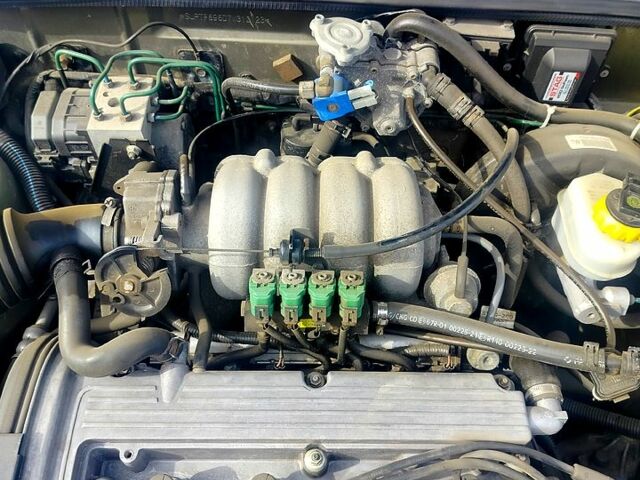 Зеленый Дэу Ланос, объемом двигателя 1.6 л и пробегом 250 тыс. км за 3000 $, фото 5 на Automoto.ua