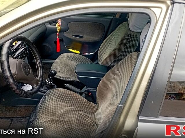 Зеленый Дэу Ланос, объемом двигателя 1.5 л и пробегом 250 тыс. км за 1300 $, фото 6 на Automoto.ua