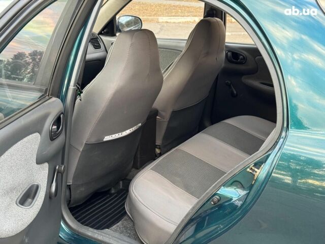 Зеленый Дэу Ланос, объемом двигателя 1.5 л и пробегом 152 тыс. км за 2990 $, фото 10 на Automoto.ua