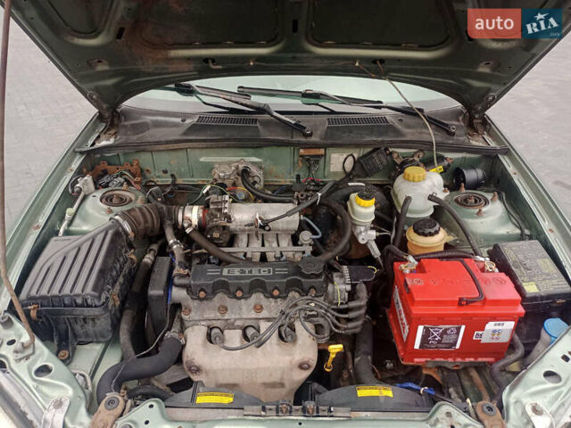 Деу Ланос 2006 у Лубнах на Automoto.ua Зелений Деу Ланос, об'ємом двигуна 1.5 л та пробігом 300 тис. км за 1700 $, фото 5 на Automoto.ua