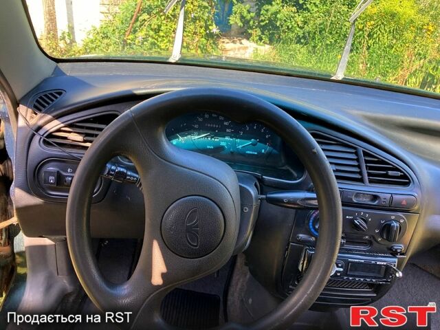 Зеленый Дэу Ланос, объемом двигателя 1.5 л и пробегом 290 тыс. км за 1000 $, фото 4 на Automoto.ua