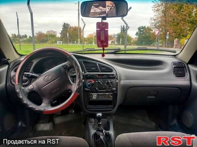 Зеленый Дэу Ланос, объемом двигателя 1.5 л и пробегом 350 тыс. км за 1450 $, фото 5 на Automoto.ua