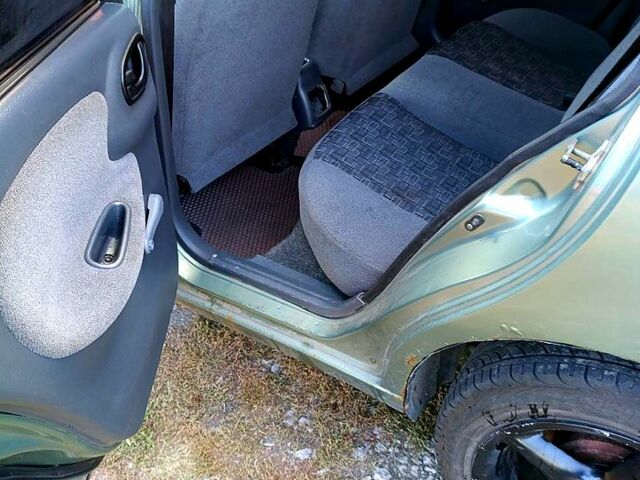 Зеленый Дэу Ланос, объемом двигателя 1.5 л и пробегом 184 тыс. км за 1900 $, фото 6 на Automoto.ua