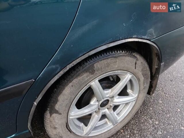 Зелений Деу Ланос, об'ємом двигуна 1.5 л та пробігом 215 тис. км за 2400 $, фото 6 на Automoto.ua