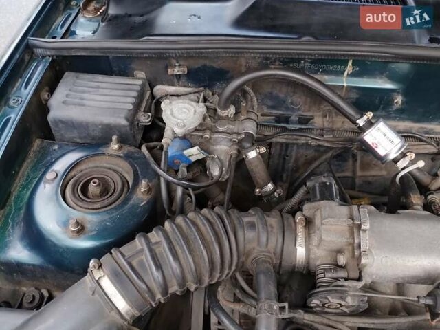 Зелений Деу Ланос, об'ємом двигуна 1.5 л та пробігом 215 тис. км за 2400 $, фото 19 на Automoto.ua