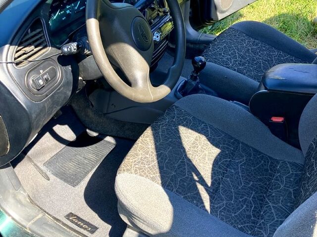 Зеленый Дэу Ланос, объемом двигателя 1.5 л и пробегом 290 тыс. км за 1000 $, фото 5 на Automoto.ua