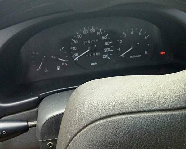 Зеленый Дэу Ланос, объемом двигателя 1.6 л и пробегом 320 тыс. км за 2000 $, фото 1 на Automoto.ua