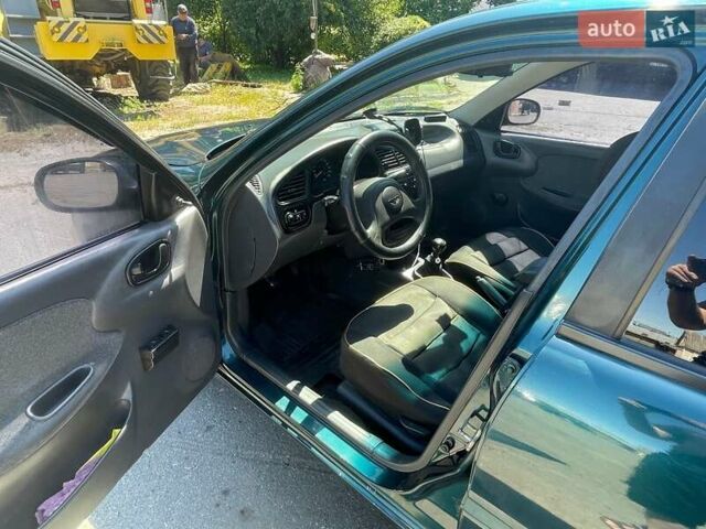 Зеленый Дэу Ланос, объемом двигателя 1.5 л и пробегом 290 тыс. км за 2550 $, фото 5 на Automoto.ua