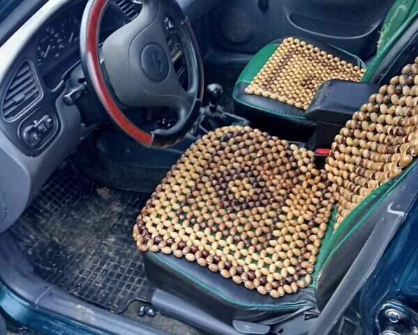 Зеленый Дэу Ланос, объемом двигателя 1.6 л и пробегом 320 тыс. км за 2000 $, фото 3 на Automoto.ua