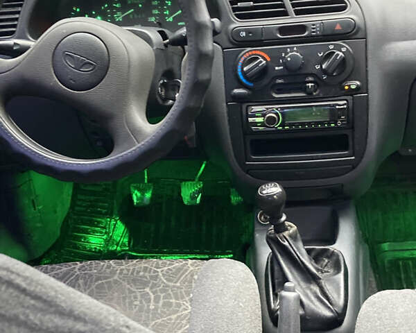 Зеленый Дэу Ланос, объемом двигателя 1.5 л и пробегом 270 тыс. км за 2000 $, фото 6 на Automoto.ua